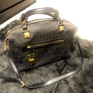 One of a Kind Micheal Kors handbag